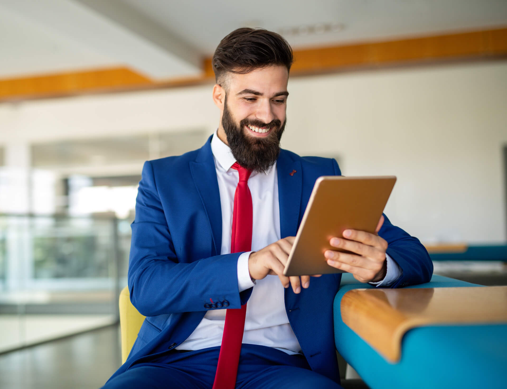business-man-working-on-his-tablet-in-the-office-K2KHEJW.jpeg business-man-working-on-his-tablet-in-the-office-K2KHEJW.jpeg